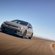 A photo of a gray VW Golf GTI hatchback.